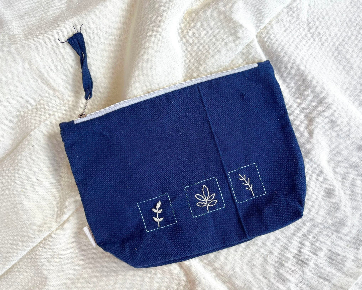 Sapphire Botanical Embroidered Pouch: Nature's Square Travel Accessory