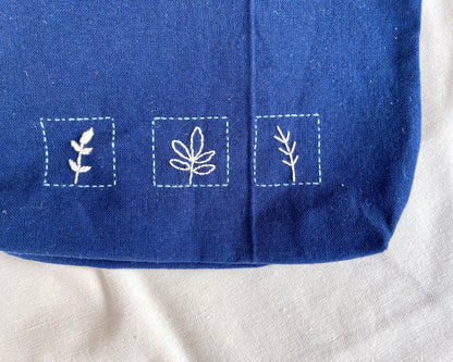 Sapphire Botanical Embroidered Pouch: Nature's Square Travel Accessory