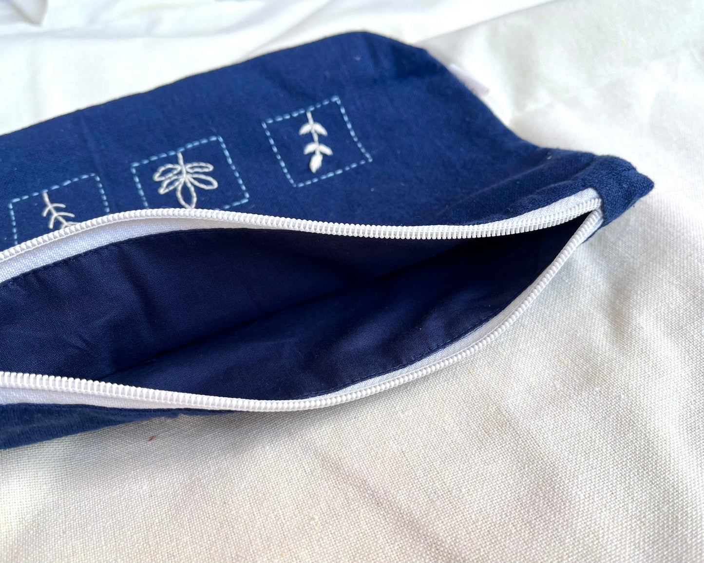 Sapphire Botanical Embroidered Pouch: Nature's Square Travel Accessory