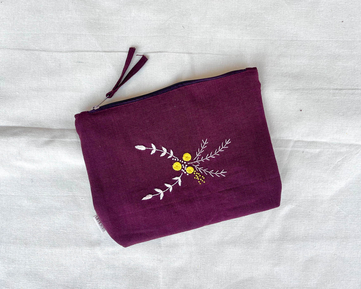 Golden Bouquet Embroidered Pouch: Floral Stitched Accessory Bag